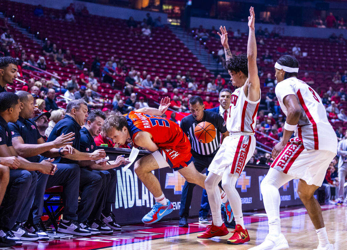 UT Martin Skyhawks guard Filip Radakovic (33) is unable to save a ball as UNLV guard Al Green ( ...