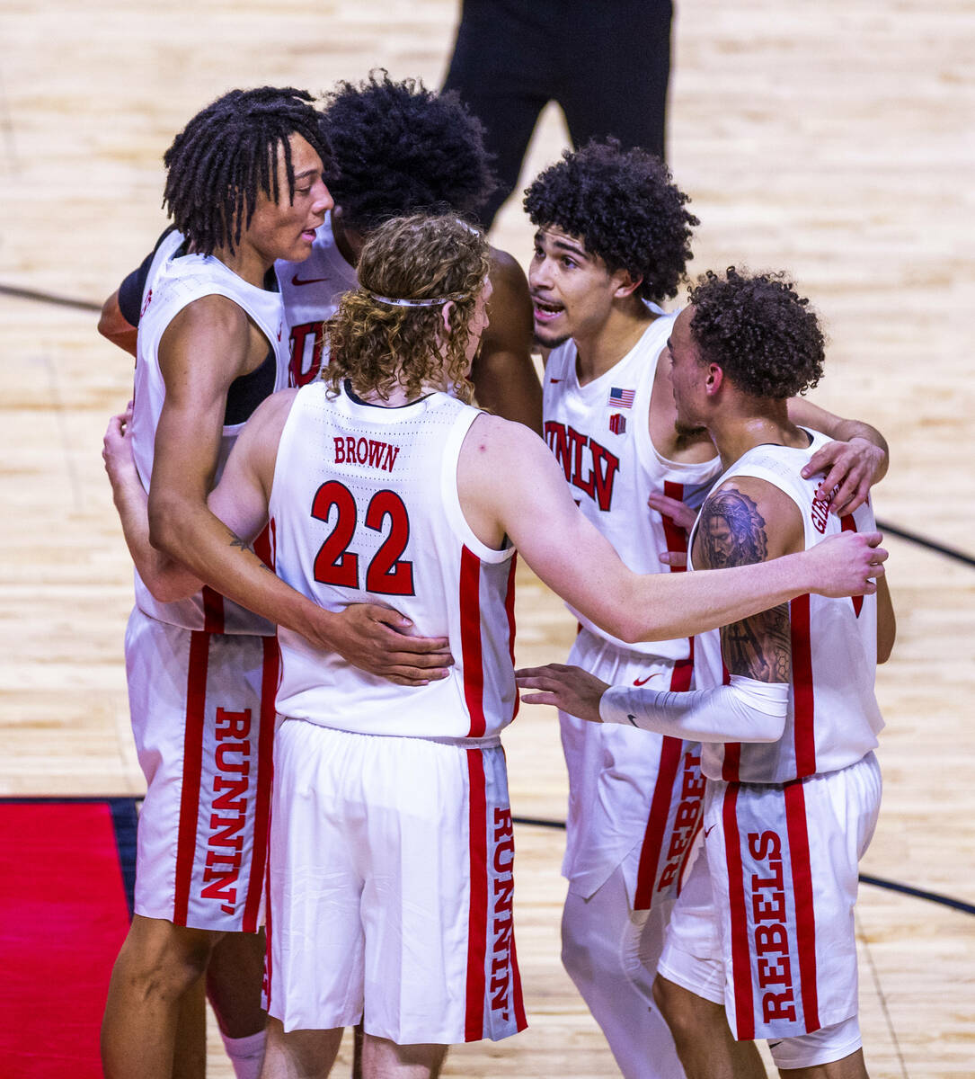 UNLV players huddle n a foul against the UT Martin Skyhawks during the first half of their NCAA ...