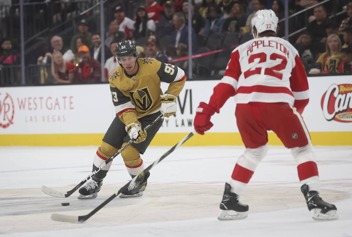 Golden Knights right wing Mitch Marner (93) skates with the puck as Detroit Red Wings center Ma ...
