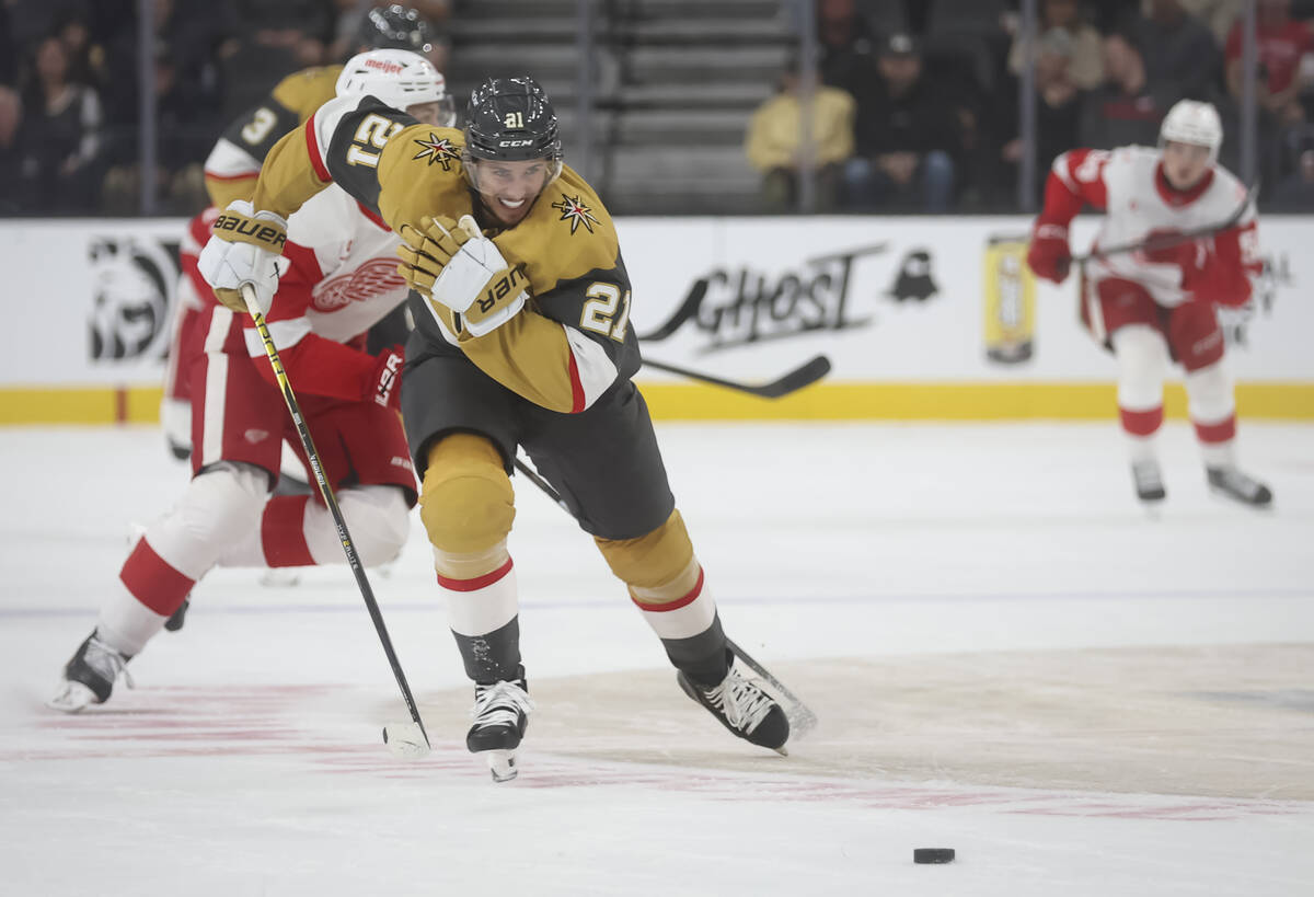 Golden Knights center Brett Howden (21) skates with the puck during the first period of an NHL ...