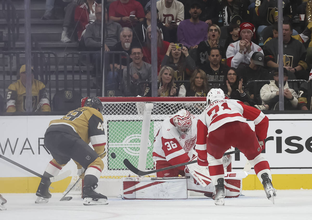 Golden Knights left wing Ivan Barbashev (49) scores a goal past Detroit Red Wings goaltender Jo ...