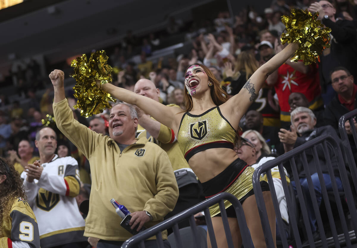 A member of the Vegas Vivas cheers after the Golden Knights scored against the Detroit Red Wing ...