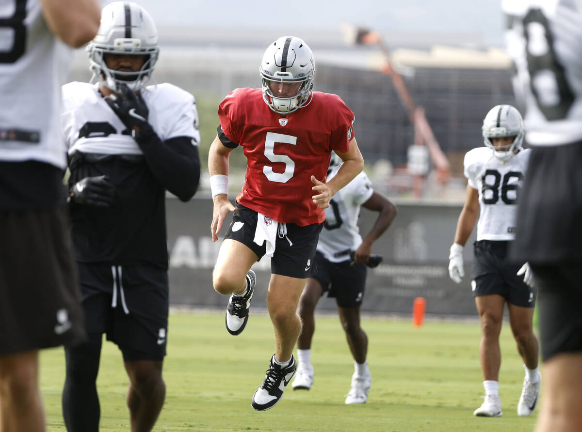 Raiders backup quarterback Cam Miller (5) warms up during team practice at the Intermountain He ...