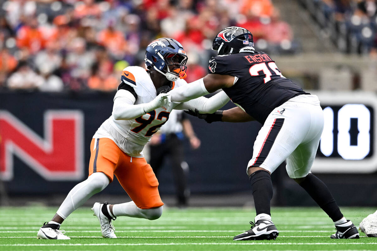 Denver Broncos linebacker Dondrea Tillman (92) defends in coverage as Houston Texans offensive ...