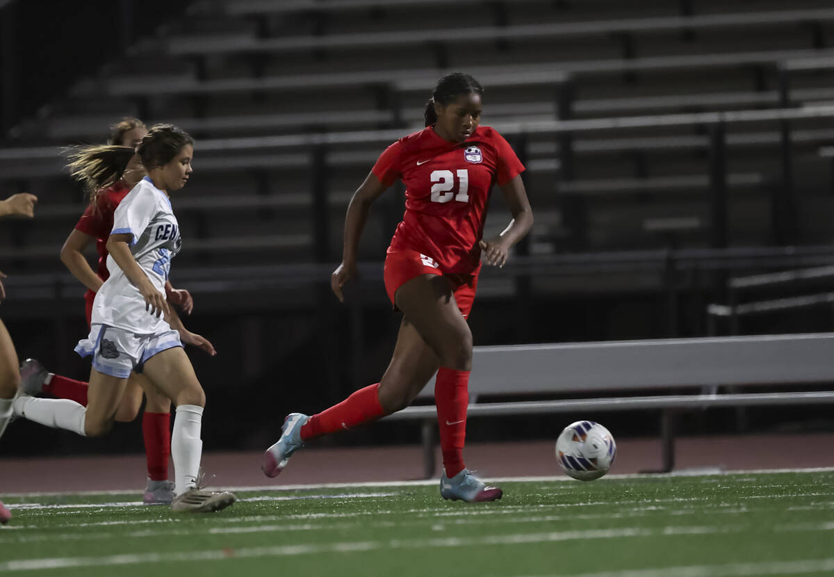 Coronado's Cate Gusick (20) brings the ball up the field against Centennial during the sec ...