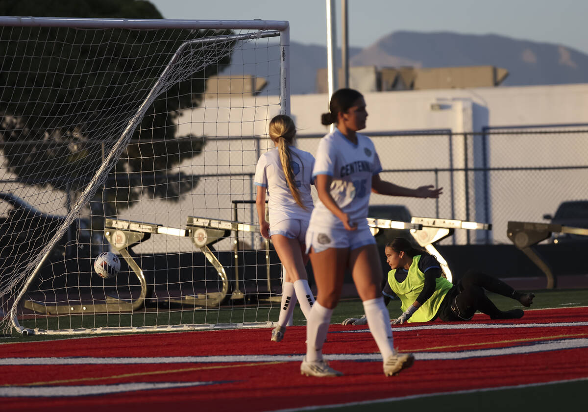 Coronado scores past Centennial goalkeeper Madelyn Hartman during the first half of a Class 5A ...