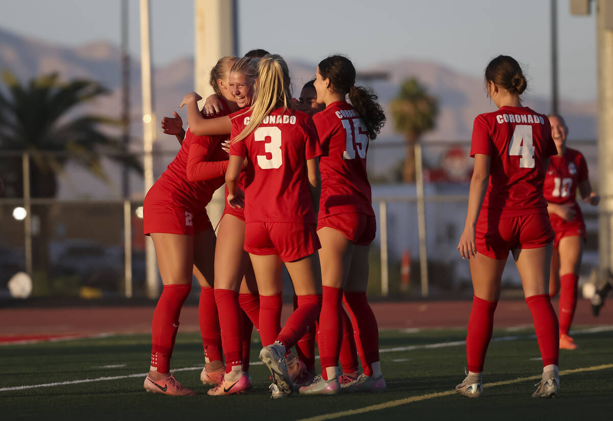 Coronado players celebrate after scoring against Centennial during the first half of a Class 5A ...