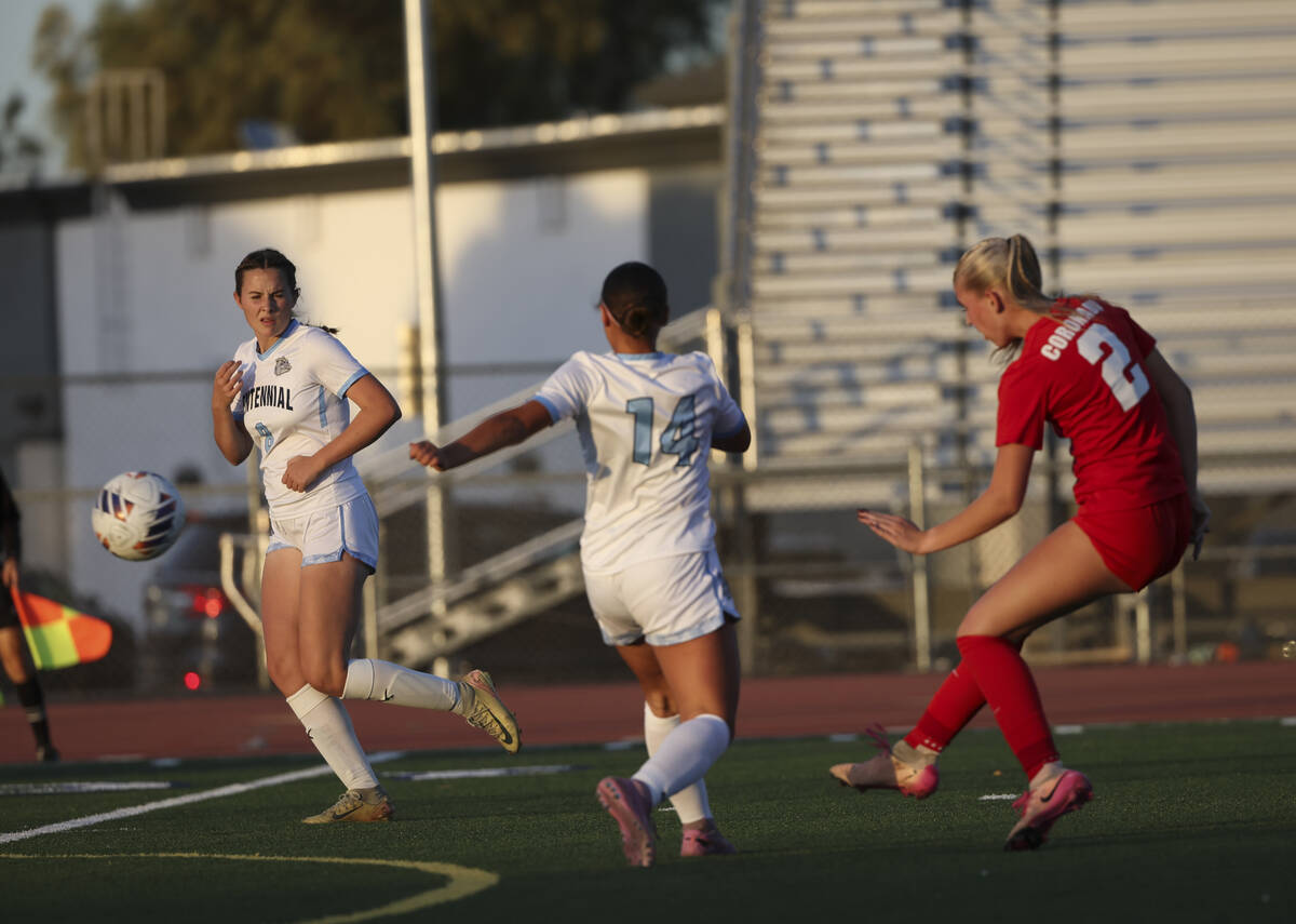 Coronado's midfielder Emily McKinney (2) kicks the ball to score against Centennial during ...