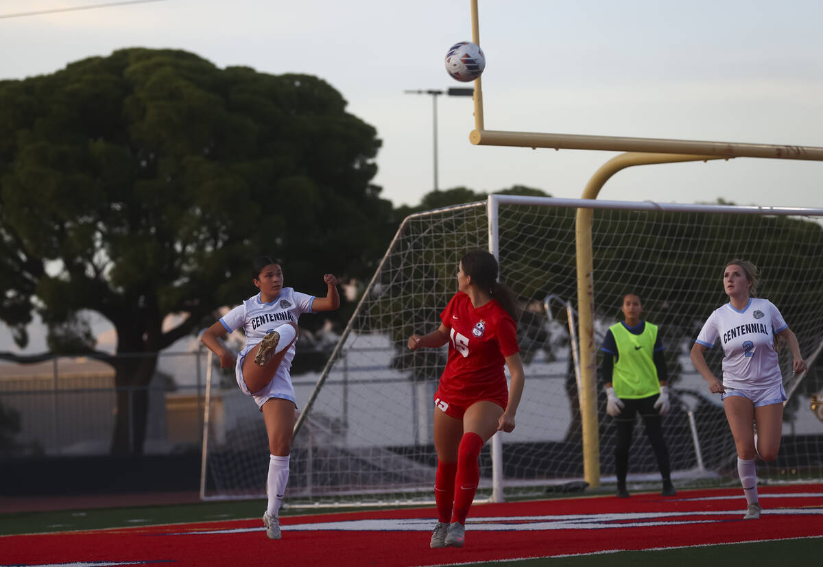 Centennial's Mia Carper (25) kicks the ball during the first half of a Class 5A girls socc ...