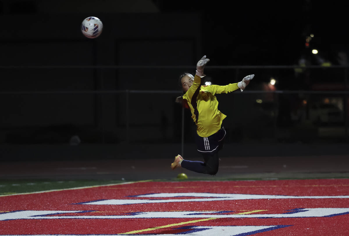 Shadow Ridge goalkeeper Keira Torres comes up short on a block against Faith Lutheran during th ...
