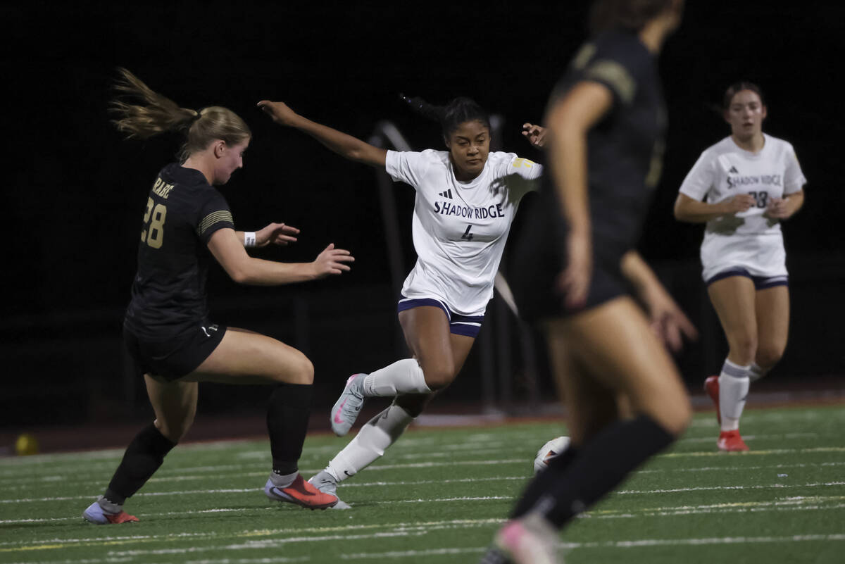 Shadow Ridge's Taylor Johnson (4) runs after the ball against Faith Lutheran's Allie ...