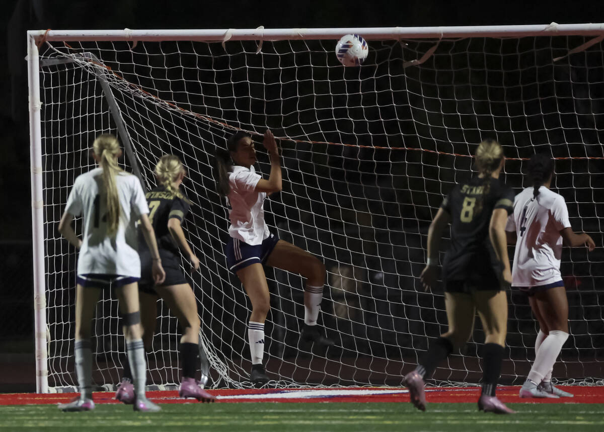 Shadow Ridge's Myla Hood (23) blocks a shot on goal from Faith Lutheran during the first h ...