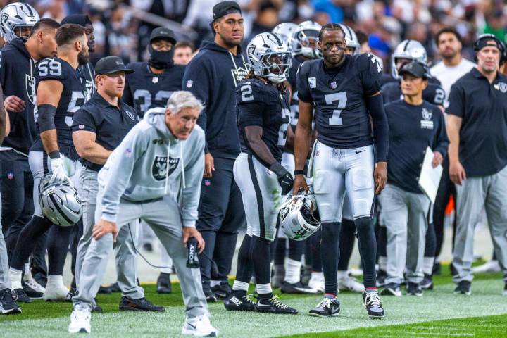 Raiders quarterback Geno Smith (7) and running back Ashton Jeanty (2) look on unhappily as the ...