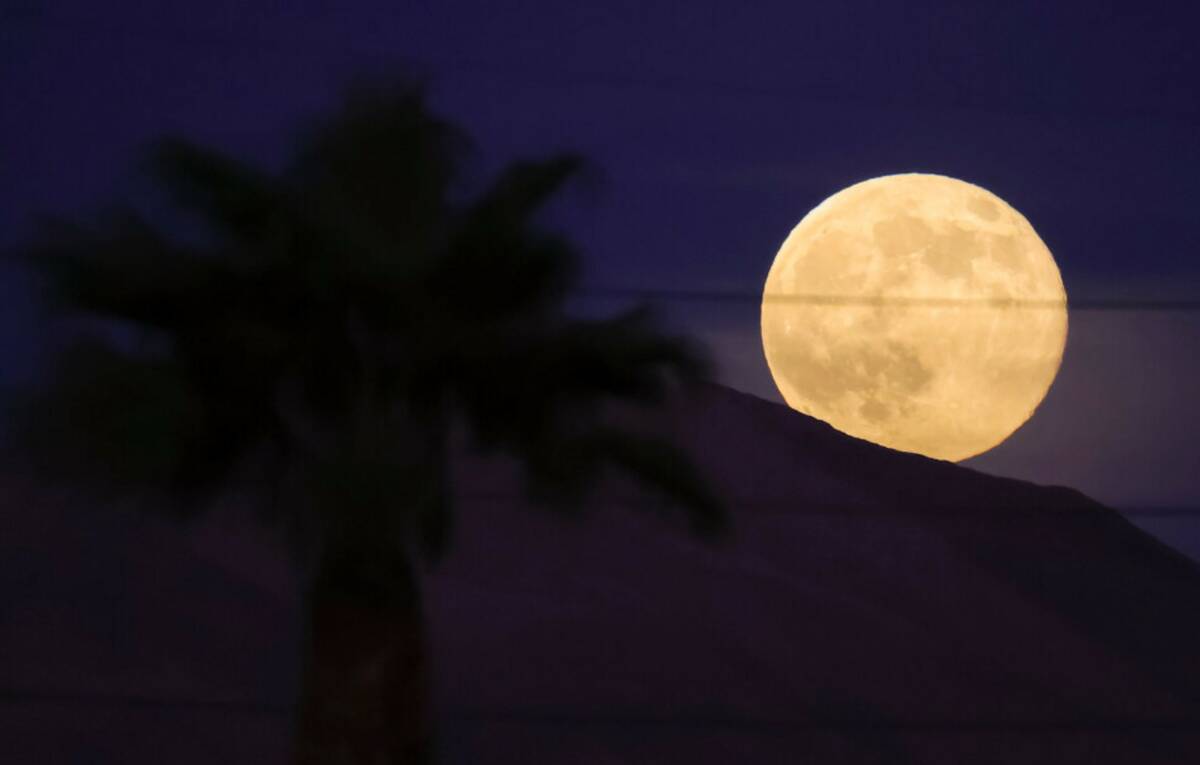 A supermoon was seen during the second half of a Class 5A girls soccer state semifinal game at ...