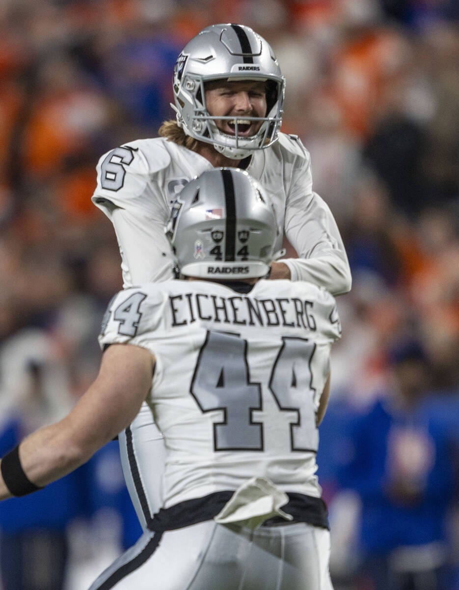 Raiders punter AJ Cole (6) celebrates a punt that landed at the one yard line with linebacker T ...