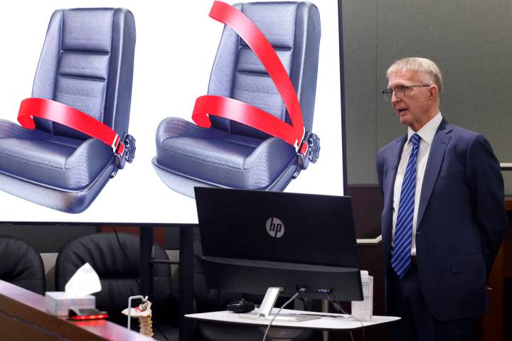 A lap belt, left, and a three-point automobile safety belt designs are displayed as attorney Ro ...