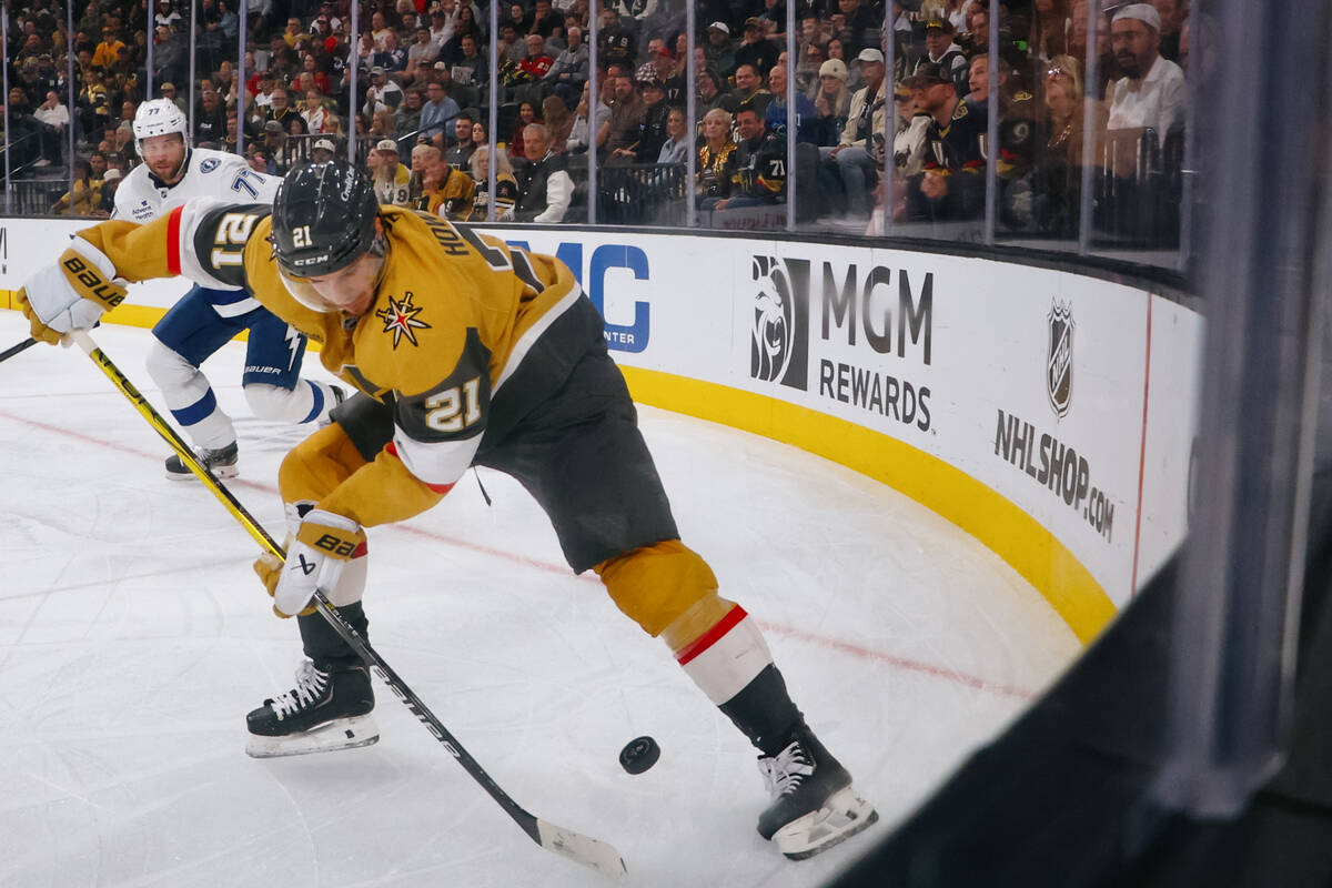 Golden Knights center Brett Howden (21) skates with the puck in the third period of the game on ...