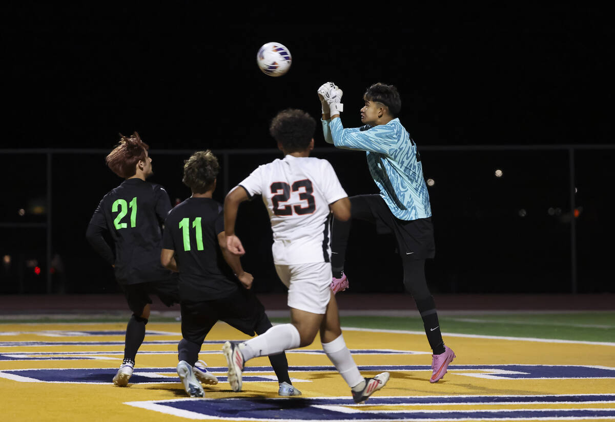 Chaparral goalkeeper Jozabad Garcia (25) blocks a shot from SLAM! Nevada during the first half ...