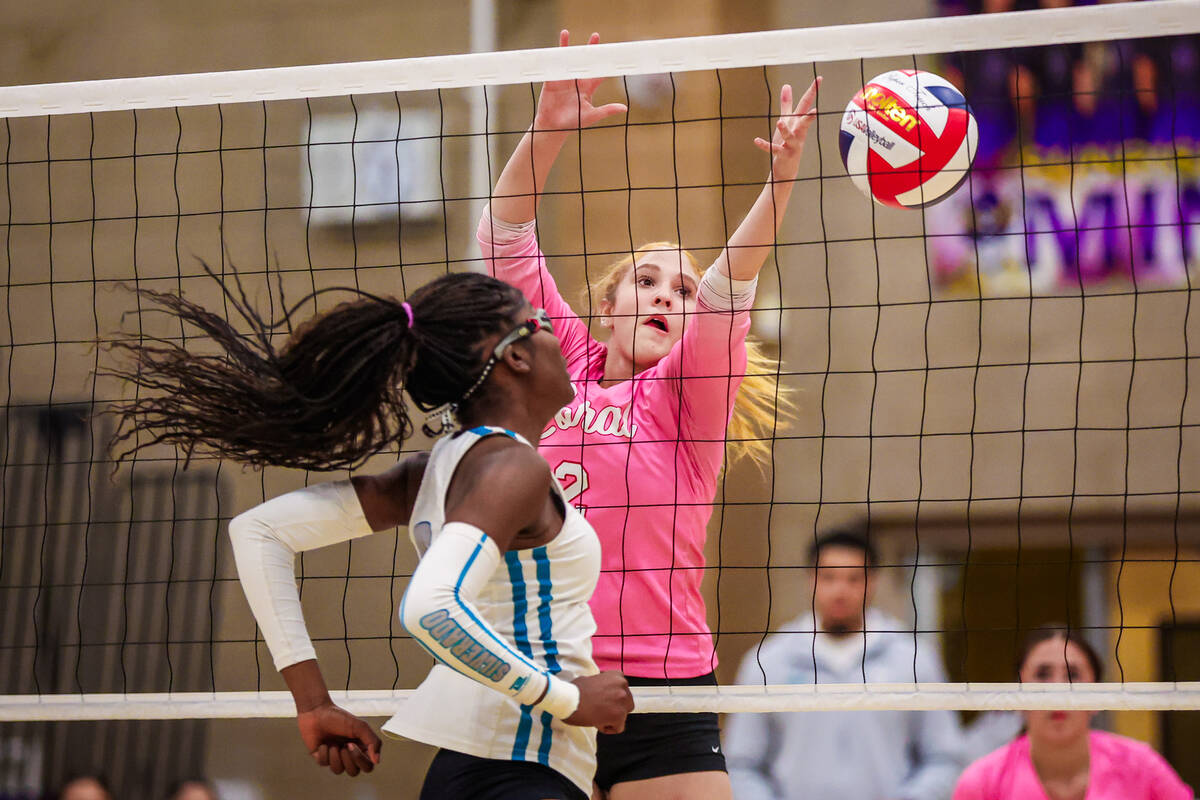 Coral middle blocker Alexa Sanchez (2) reaches to bump the ball during a class 4A girls volleyb ...