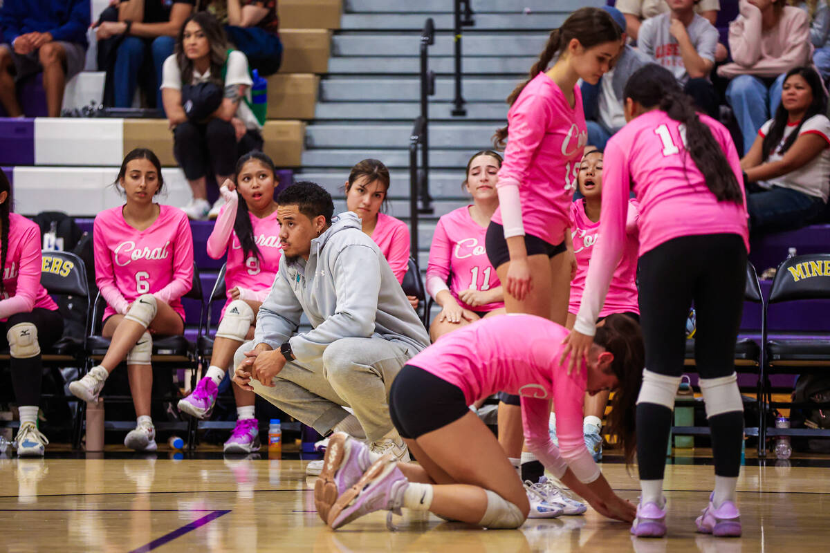 Coral head coach Joselito Diez looks on during a class 4A girls volleyball state semifinals gam ...