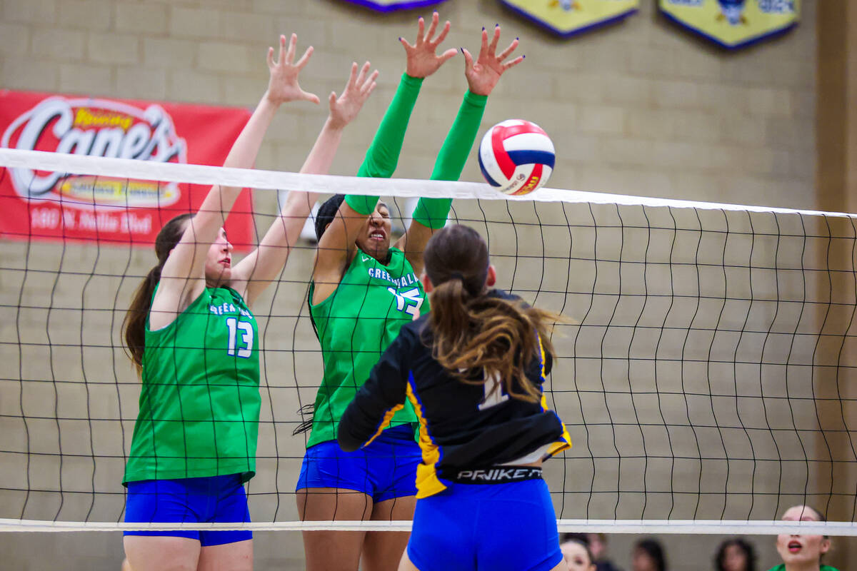 Green Valley outside hitter Braelynn Shaw (15) prepares to send the ball back over the net duri ...
