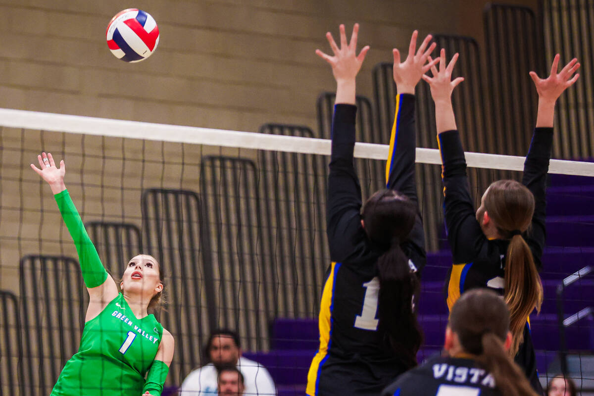 Green Valley outside hitter Gio Ortega reaches for the ball during a class 4A girls volleyball ...