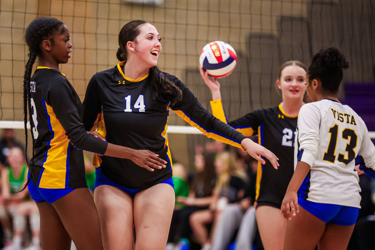 Sierra Vista teammates celebrate during a class 4A girls volleyball state semifinals game at Su ...