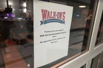 The sign posted to the door of Walk-On's inside Harrah's Las Vegas on Nov. 6, 2025. (Las Vegas ...