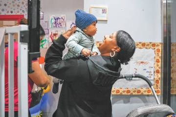 Jassmyne Collette-Koonce picks up her 7-month-old son from Artsy Nannies after her study sessio ...