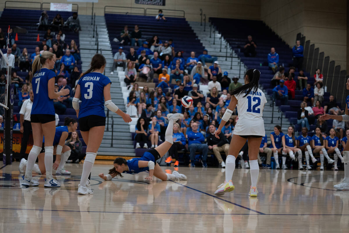 Bishop Gorman’s Sienna Gostanian (5) dives for the ball during a Class 5A girls volleyba ...