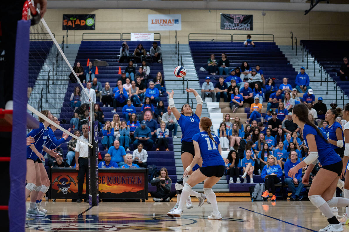 Bishop Gorman setter Trinity Thompson (9) controls the ball during a Class 5A girls volleyball ...