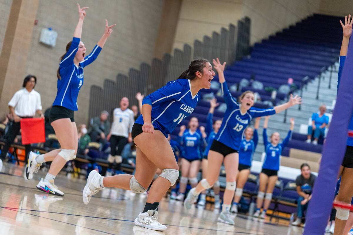 Carson reacts after winning a point during a Class 5A girls volleyball state semifinal match ag ...