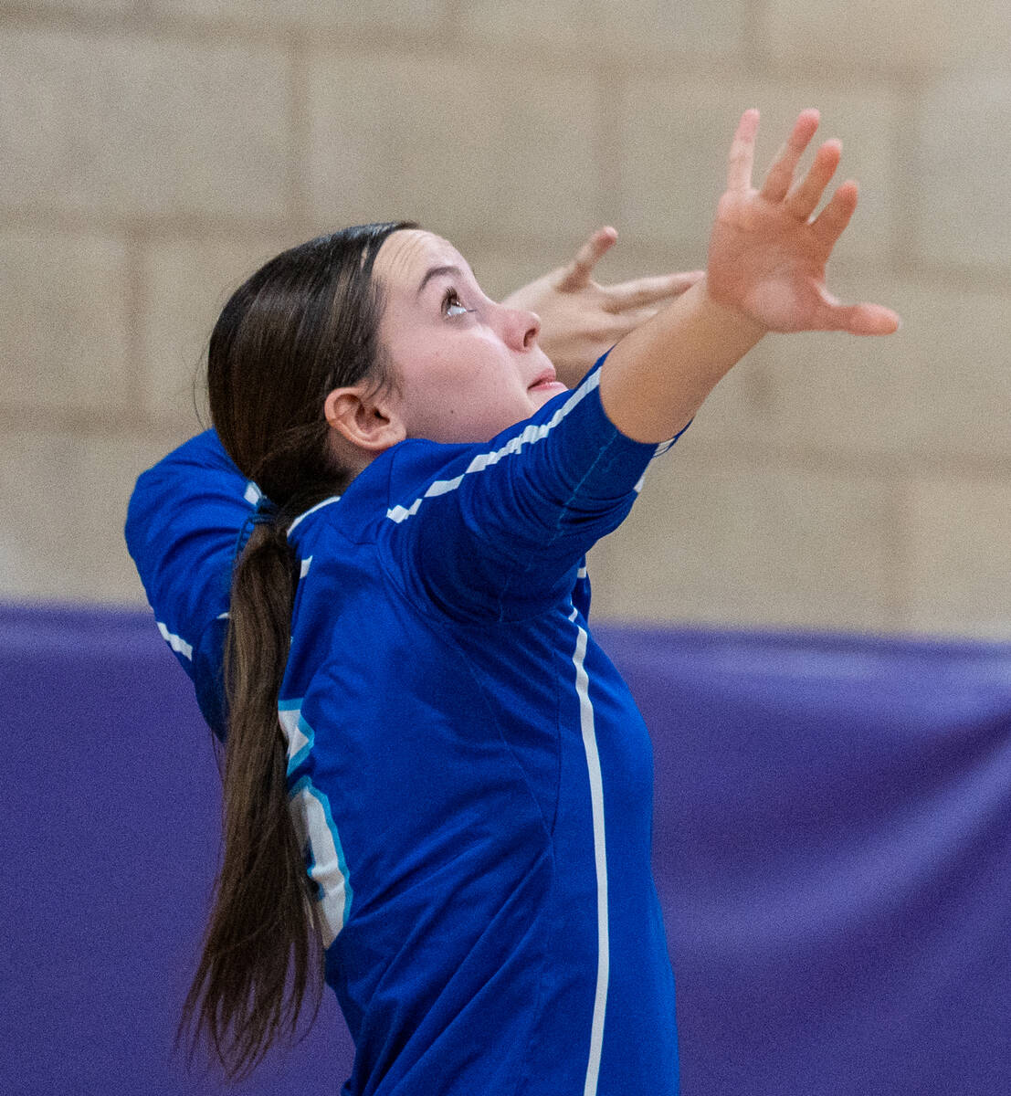 Carson’s Addi McCune (6) winds up to serve the ball during a Class 5A girls volleyball s ...