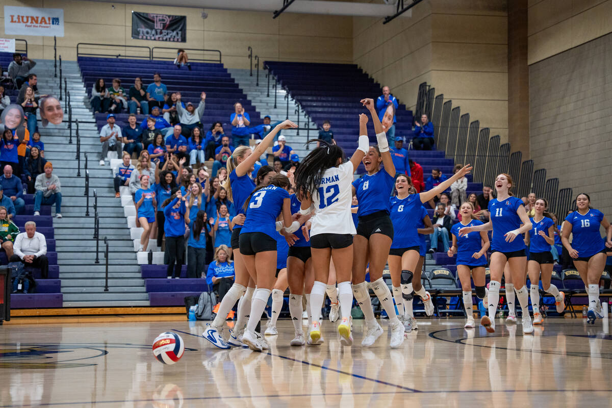 Bishop Gorman celebrates a 3-0 win against Carson in a Class 5A girls volleyball state semifina ...