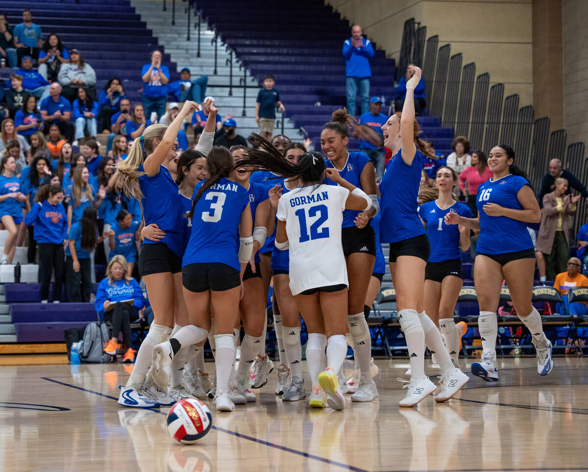 Bishop Gorman celebrates a 3-0 win against Carson in a Class 5A girls volleyball state semifina ...