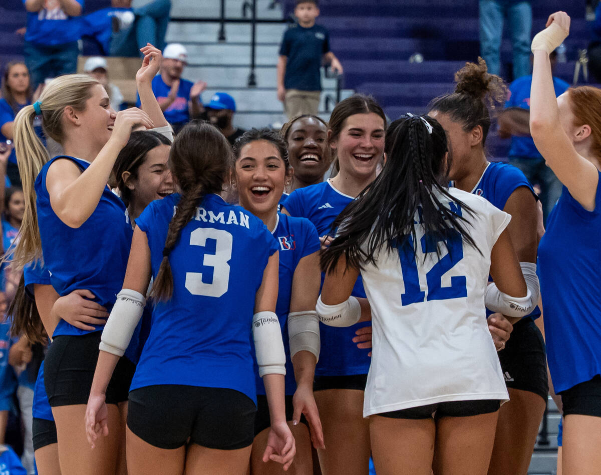 Bishop Gorman celebrates a 3-0 win against Carson in a Class 5A girls volleyball state semifina ...