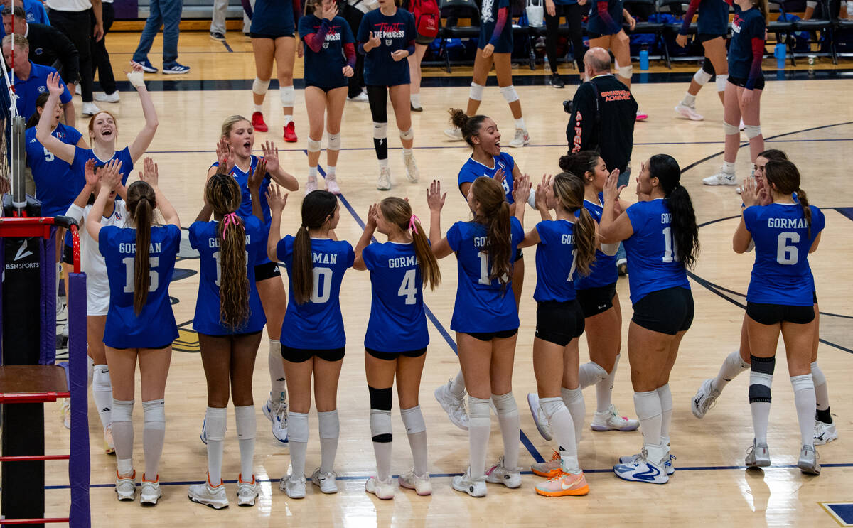 Bishop Gorman high fives after a 3-0 win against Carson in a Class 5A girls volleyball state se ...