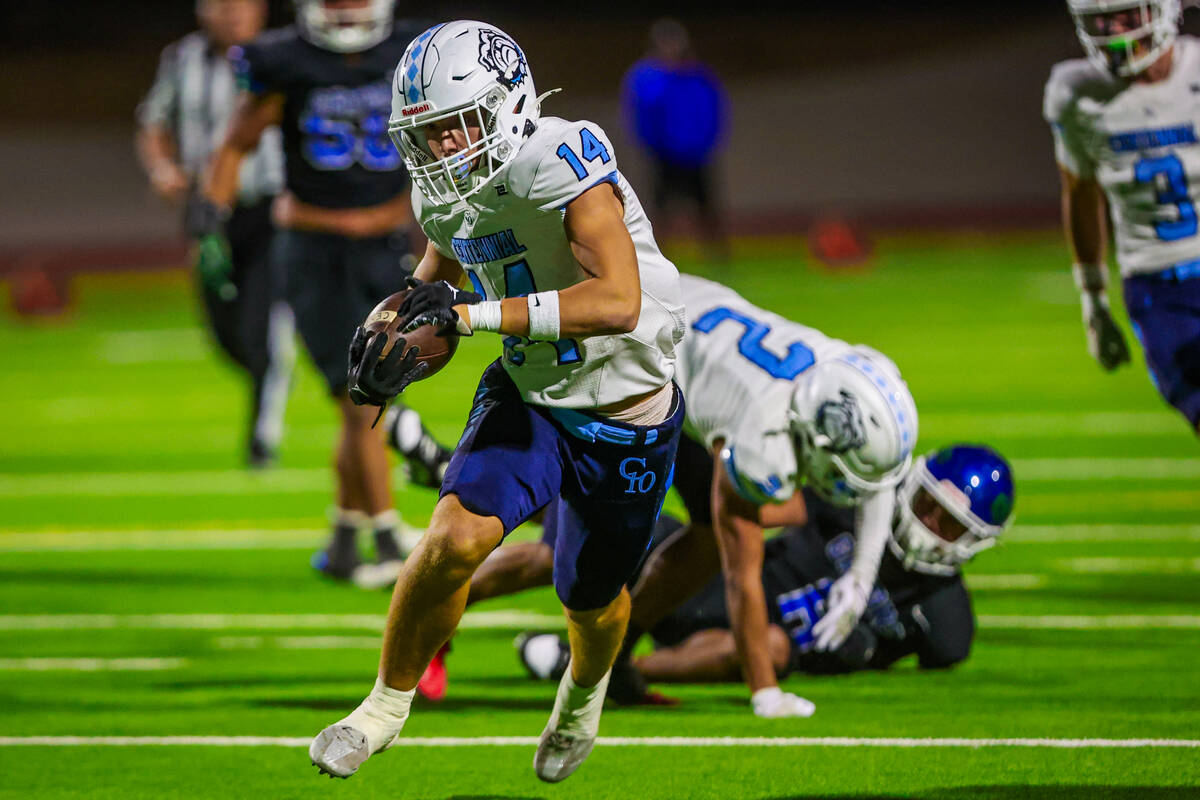 Centennial running back Brogan Church runs the ball during a class 5A high school football sout ...