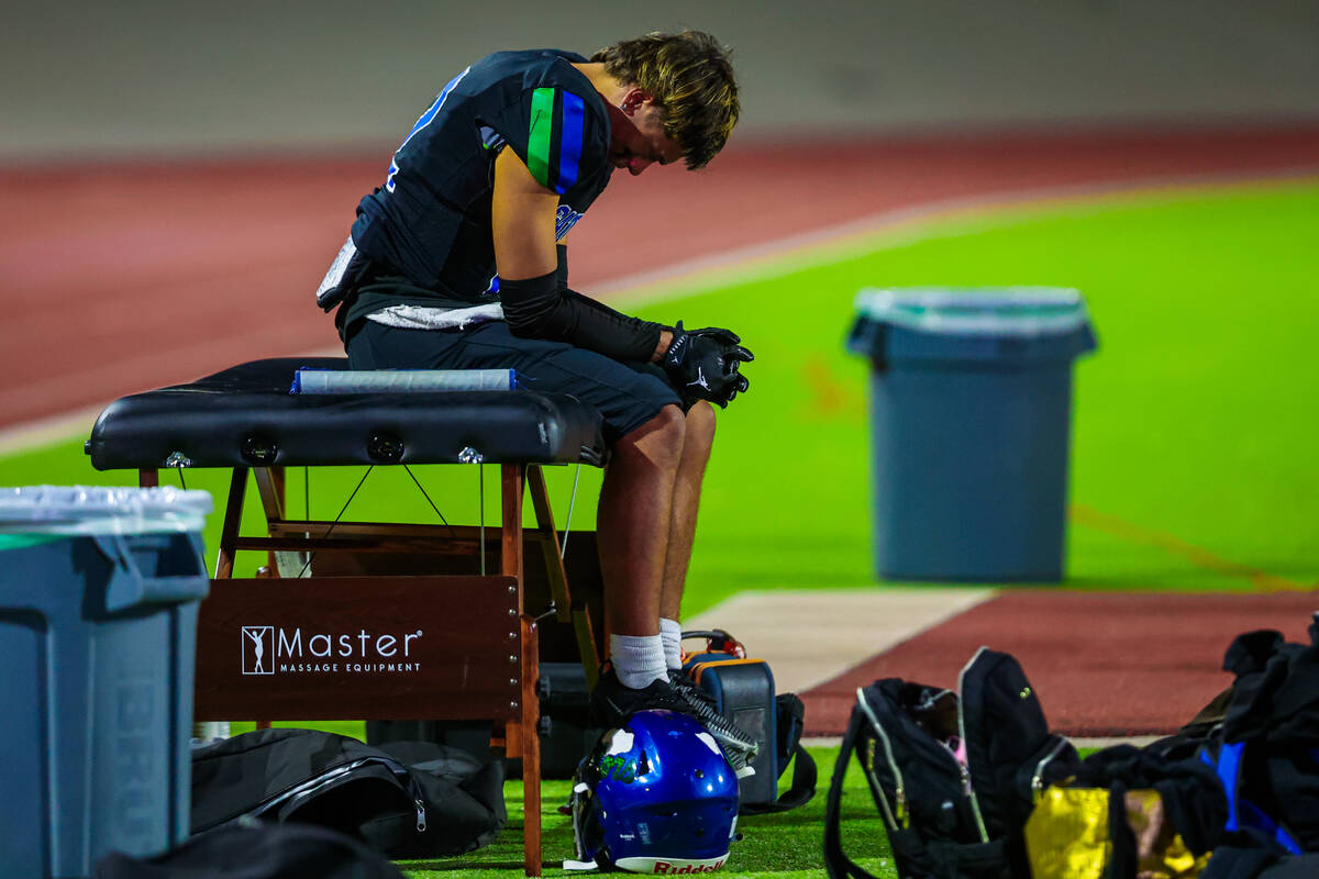 Green Valley Dominic Araujo takes a moment on the sidelines during a class 5A high school footb ...