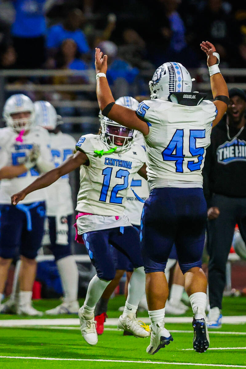 Centennial running back Kolten Silbernagel, who kicked a field goal, celebrates afterwards duri ...