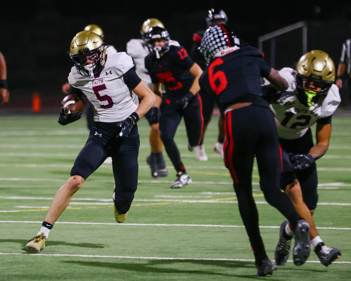 Faith Lutheran wide receiver Jaden Mason (5) runs upfield during the Southern Region semifinal ...