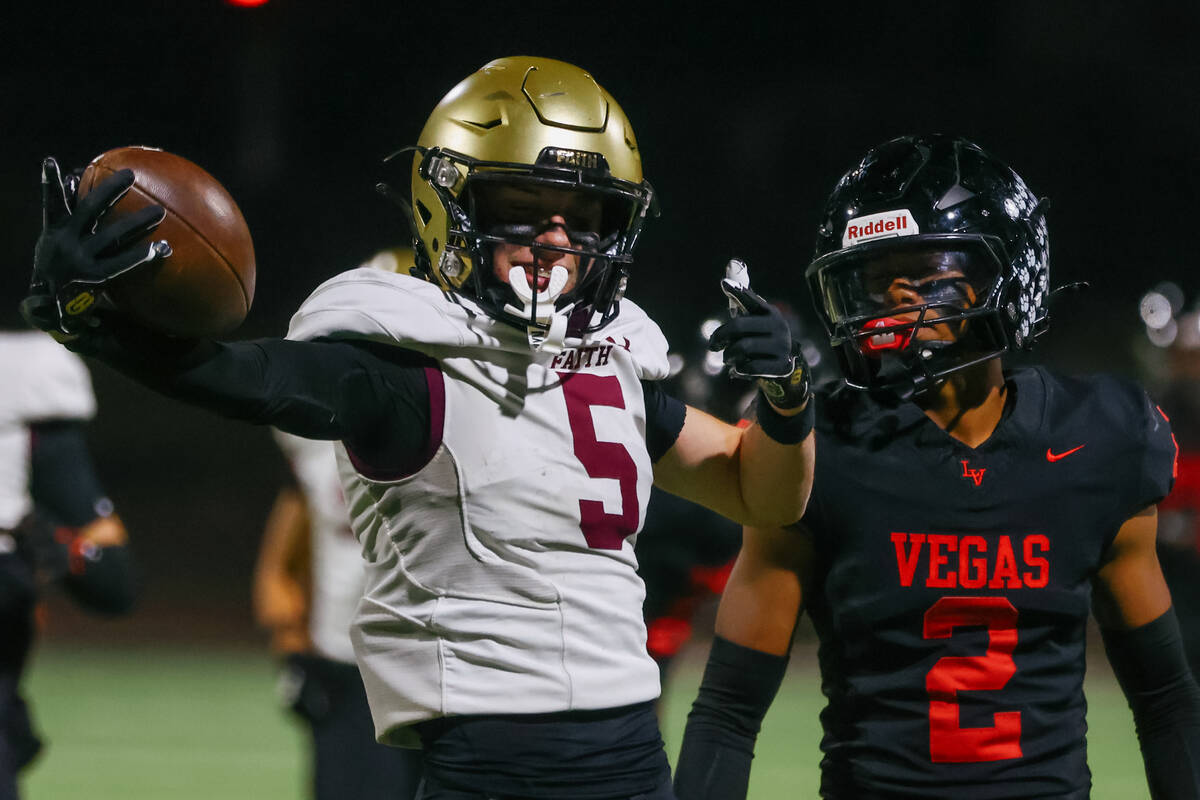 Faith Lutheran wide receiver Jaden Mason (5) celebrates earning a first down for his team durin ...
