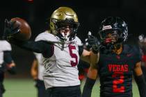 Faith Lutheran wide receiver Jaden Mason (5) celebrates earning a first down for his team durin ...
