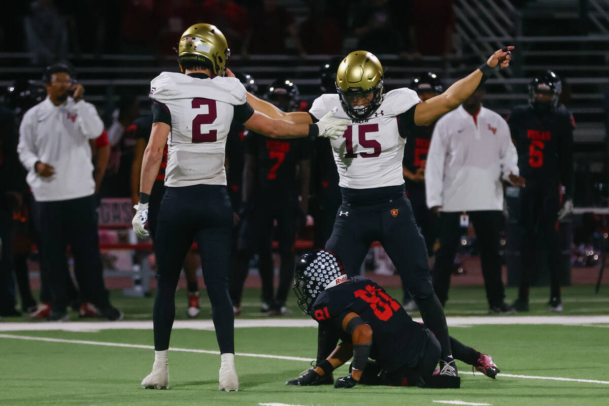 Faith Lutheran defensive lineman Cooper Offermann (15) celebrates a stop against Las Vegas wide ...