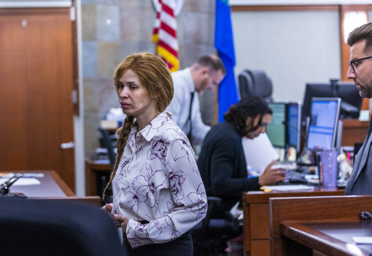 Devyn Michaels, accused of killing her on-again, off-again boyfriend Johnathan Willette, is led ...