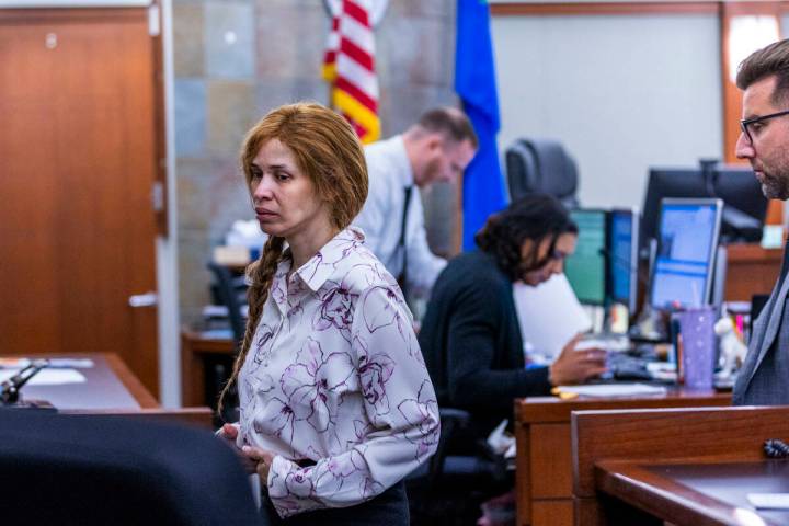 Devyn Michaels, accused of killing her on-again, off-again boyfriend Johnathan Willette, is led ...