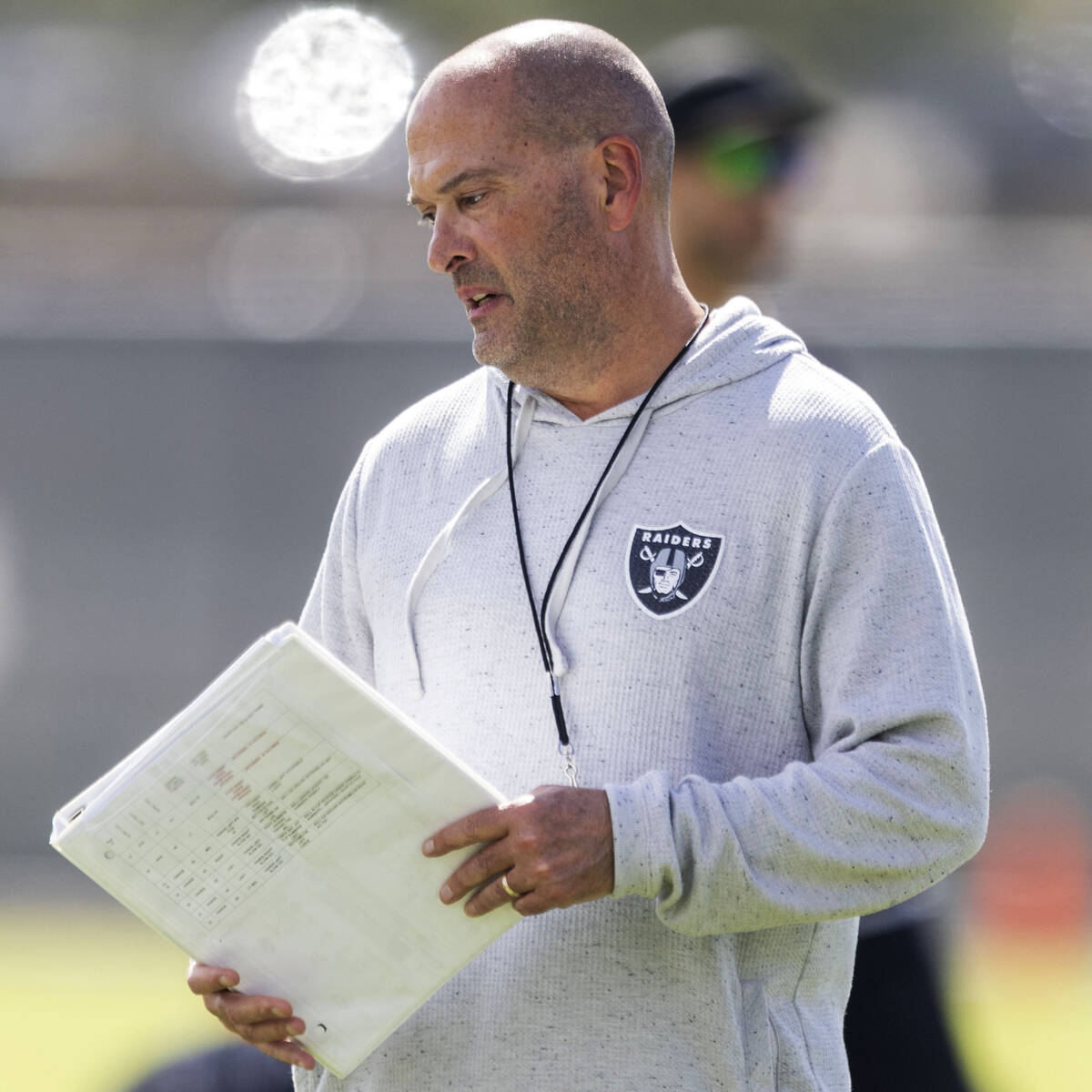 Raiders special teams coordinator Tom McMahon walks through the team’s practice at the I ...