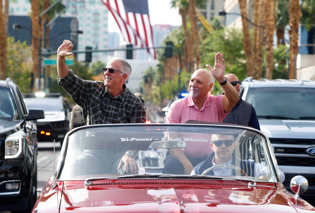 Gov Joe Lombardo, left, and Lt. Gov. Stavros Anthony wave to the crowd as they participate in ...