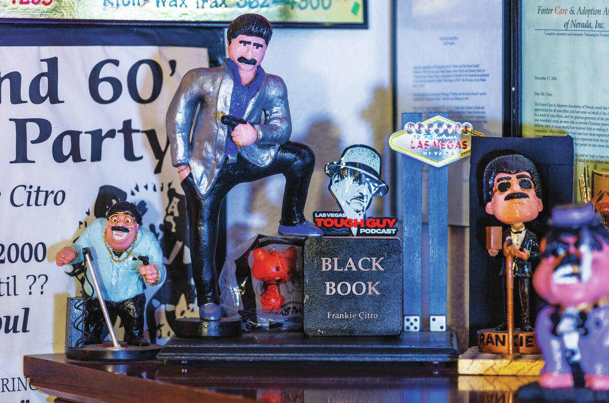 Frank Citro's memorabilia includes numerous caricatures of him including one he had made w ...