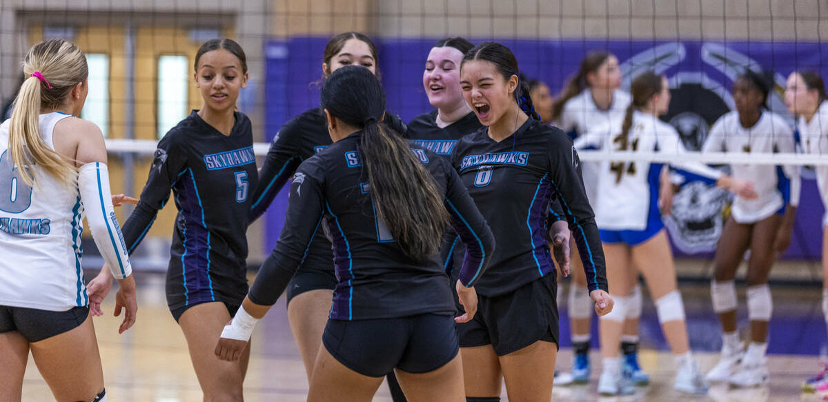 Silverado players celebrate a critical point against Sierra Vista during their 4A girls volleyb ...
